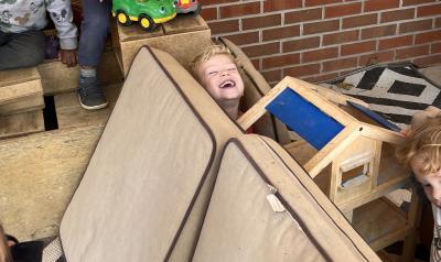 Children playing in the couch