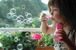 Girl blowing bubbles