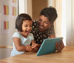 Mother and daughter with ipad/tablet