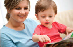 Mom reading a book with her toddler