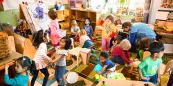 young children of varying backgrounds playing in a classroom