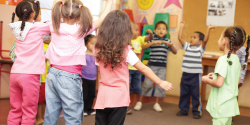 a group of children dancing