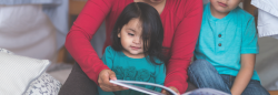 Family reading a book