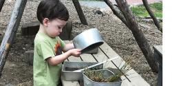 Preschool boy playing outside