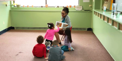 a teacher reading to children