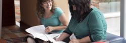 Conference attendees looking inside NAEYC Professional Learning Institute program