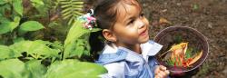 Girl exploring during nature play