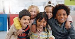 children smiling together in school