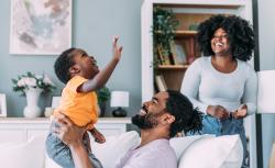 Family playing in their house