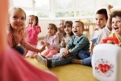 Children celebrating in a classroom