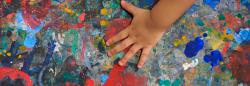 A child playing with paint