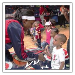 Children meeting WNBA players