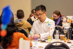 NAEYC Annual Conference attendees learning to make and tinker in a pre-conference workshop. 