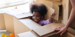 a child playing in a box