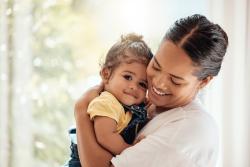 a mother holding her child