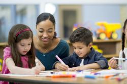 Students coloring at their desks