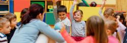 Preschool children sitting in a circle