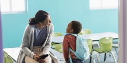 A teacher and student having an after class discussion