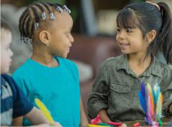 two children looking at each other