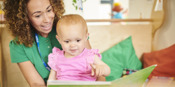 an adult reading with a child