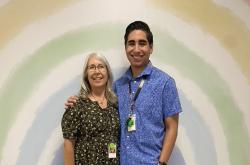 Two teachers posing with each other