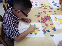 Child playing with materials