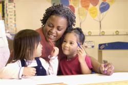 A teacher working with young children