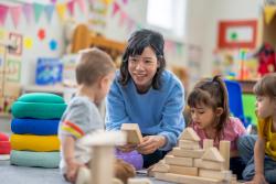 A teacher working with students