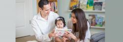 Family reading with toddler