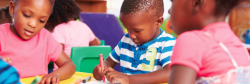 Children drawing on drawing table