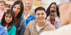 Diverse classroom with parents and children