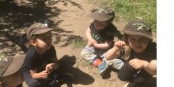 Children sitting on the ground