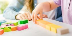 a child playing with blocks