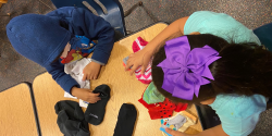 a child sharing family artifacts with the class