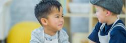 Two preschool boys smiling