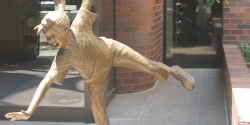 Golden child statue outside NAEYC headquarters