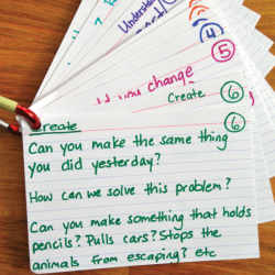 Index cards with sample questions for children.