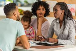 A family and teacher discuss allowing a child to freely engage in dramatic play.