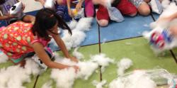 Children playing with pillows for maker fest