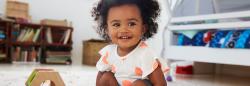 Little girl playing in play room