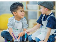 Two boys painting