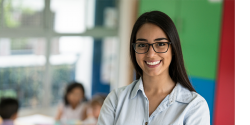 A young professional in a classroom.