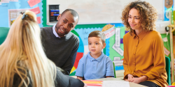 parents and teachers discussing their child