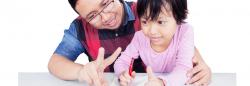 Teacher and student engaging in play and conversation
