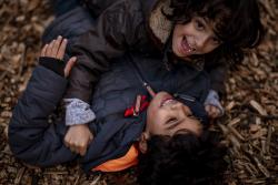 Two children playing outside