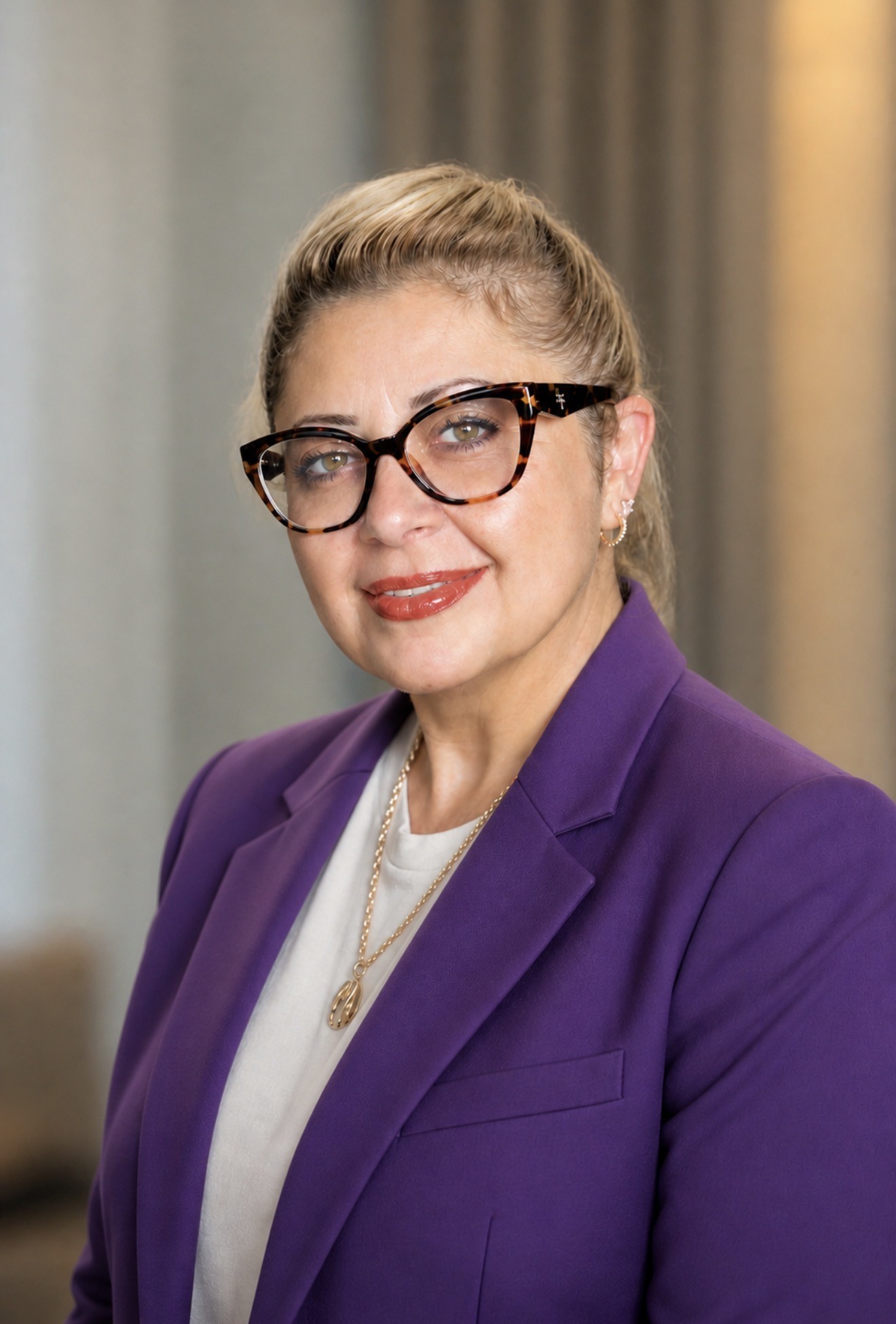 Headshot of Berna Artis, Executive Director of DCAEYC